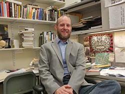 Photo of Professor Scott Rudd in his office